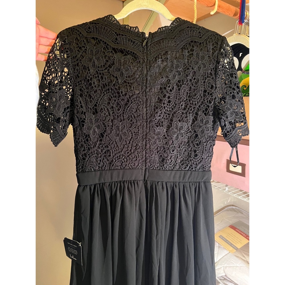 Black Lulu’s Cocktail dress. Never worn! Size Large.